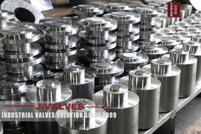 Valve Parts Machining Workshop: Skilled Workers Operating CNC Machines for the Oil and Gas Industry